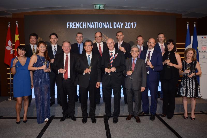 The Financial Secretary, Mr Paul Chan (front row, fourth left), is pictured with the Consul General of France in Hong Kong and Macau, Mr Eric Berti (front row, centre), and other guests at the French National Day 2017 reception this evening (July 14).