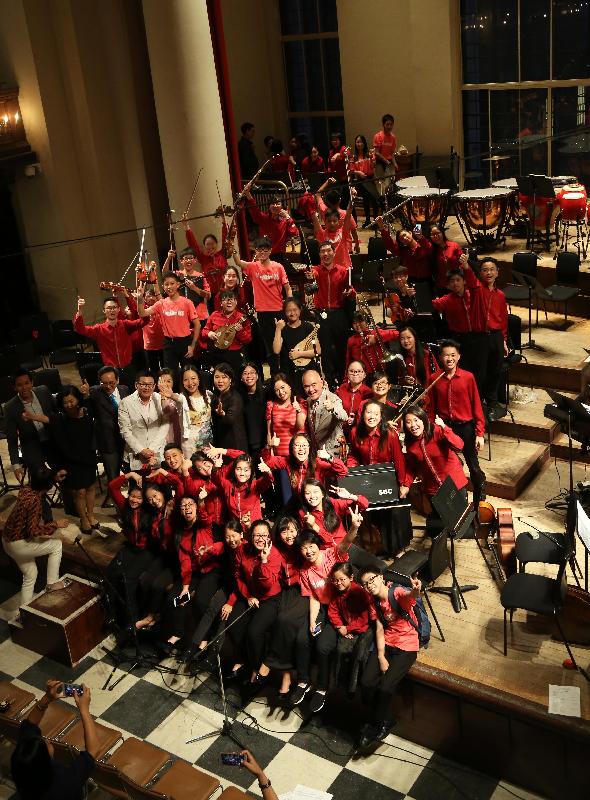 The Director-General of the Hong Kong Economic and Trade Office, London, Ms Priscilla To, with the Combined Youth Orchestra of Hong Kong's Music for Our Young Foundation at St John's Smith Square in London on July 13 (London time).