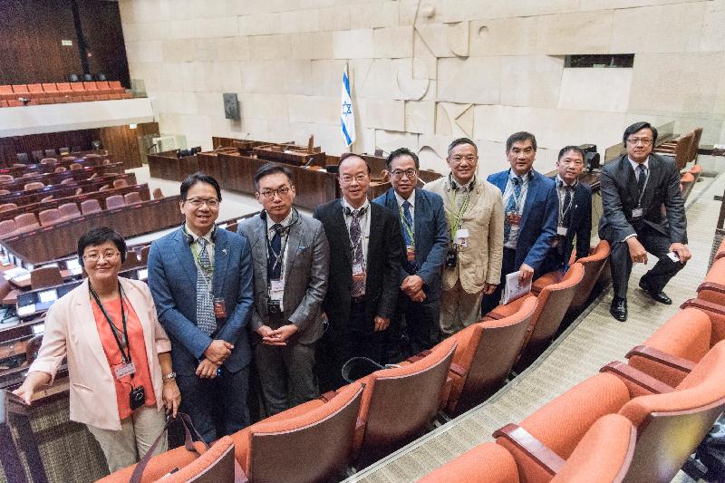The delegation of the Legislative Council Panel on Commerce and Industry visits the Knesset (Israeli Parliament) building and are pictured in the Plenum Hall today (July 25, Israel time). (From right) Dr Junius Ho, leader of the delegation Mr Wu Chi-wai, Mr Chung Kwok-pan, Mr Paul Tse, Dr Lo Wai-kwok, Mr Ma Fung-kwok, Mr Alvin Yeung, Mr Charles Mok and Dr Helena Wong.