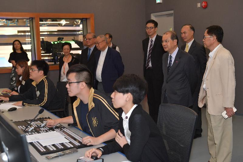 The Chief Secretary for Administration, Mr Matthew Cheung Kin-chung (second right), visits Cross-media Visual Production Studio Control Centre while touring Chu Hai College of Higher Education as part of his visit to Tuen Mun District today (August 1). 