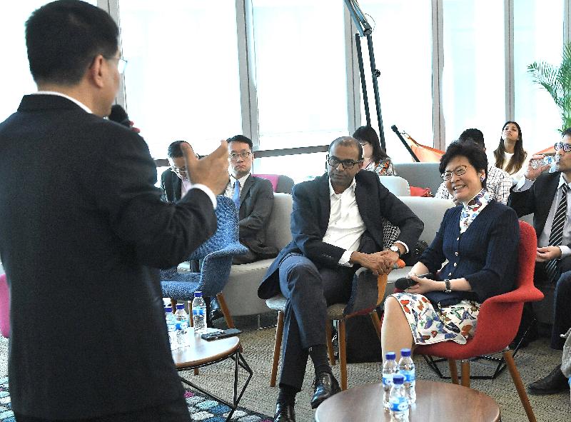 The Chief Executive, Mrs Carrie Lam, continued her visit to Singapore today (August 3). Photo shows Mrs Lam (first right) visiting GovTech Hive, an innovation lab for digital services, and being briefed by the Deputy Chief Executive of the Government Technology Agency of Singapore (GovTech), Mr Chan Cheow Hoe. Next to Mrs Lam is the Senior Minister of State for Communications and Information and Education of Singapore, Dr Janil Puthucheary (second right).