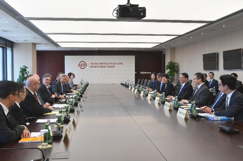 The Chief Executive, Mrs Carrie Lam (fourth right), meets the President of the Asian Infrastructure Investment Bank, Mr Jin Liqun (sixth left), in Beijing this morning (August 7). Also joining the meeting is the Financial Secretary, Mr Paul Chan (fifth right).