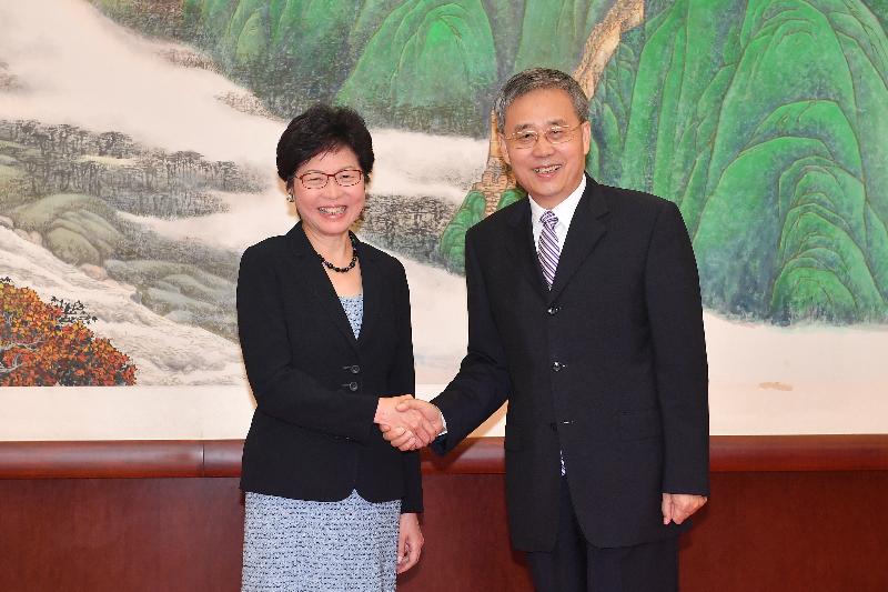 The Chief Executive, Mrs Carrie Lam (left), met the Chairman of the China Banking Regulatory Commission, Mr Guo Shuqing (right), in Beijing this morning (August 8). Mrs Lam is pictured shaking hands with Mr Guo before the meeting.