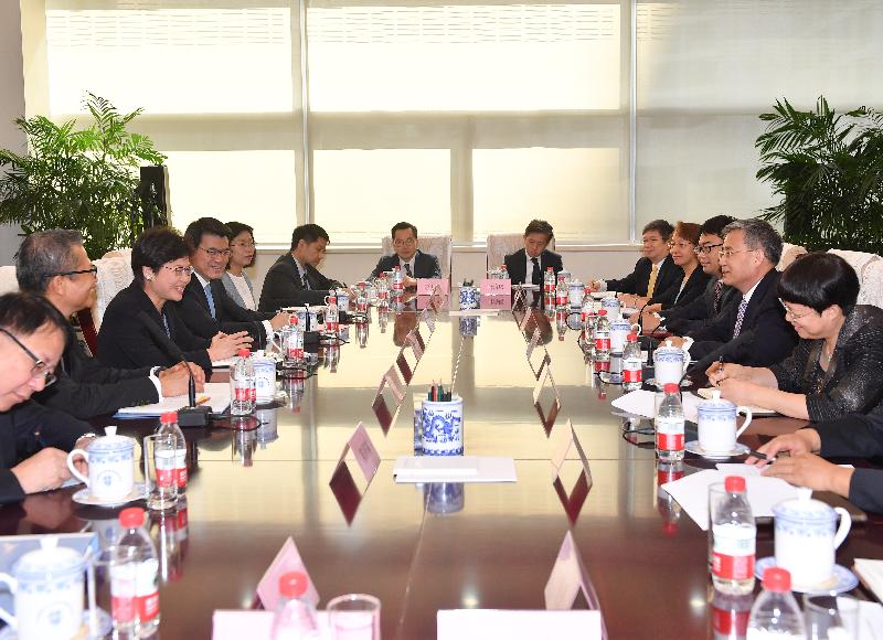 The Chief Executive, Mrs Carrie Lam (third left), meets the Chairman of the China Banking Regulatory Commission, Mr Guo Shuqing (second right), in Beijing this morning (August 8). Also joining the meeting are the Financial Secretary, Mr Paul Chan (second left), and the Secretary for Commerce and Economic Development, Mr Edward Yau (fourth left).