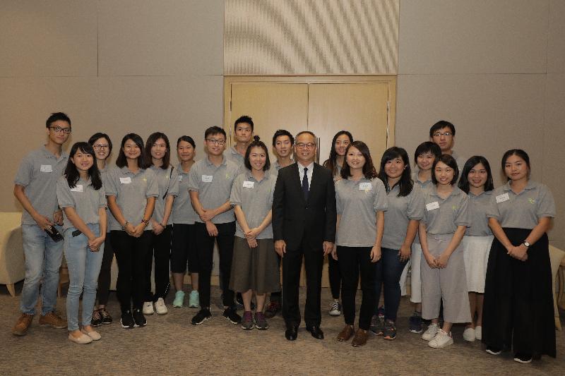 The Secretary for Home Affairs, Mr Lau Kong-wah (ninth right), meets with the delegates of the Service Corps programme (Phase VII) to learn about their voluntary teaching experiences in Shaoguan and Meizhou in Guangdong Province before attending the programme's certificate presentation ceremony today (August 12).