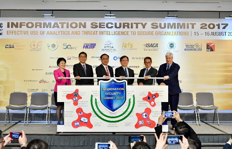 The Secretary for Innovation and Technology, Mr Nicholas W Yang (third left); the Chairman of the Hong Kong Productivity Council (HKPC), Mr Willy Lin (third right); the Executive Director of the HKPC, Mrs Agnes Mak (first left); the Chairman of the Information Security Summit 2017 Organising Committee, Mr Dale Johnstone (first right); the Government Chief Information Officer, Mr Allen Yeung (second left); and the Privacy Commissioner for Personal Data, Mr Stephen Wong (second right), officiate at the Information Security Summit 2017 today (August 15).