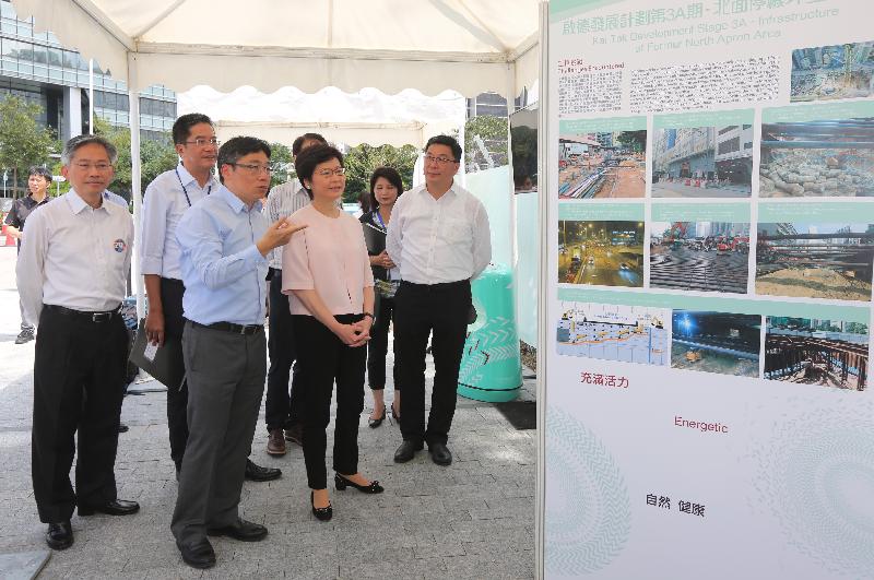 The Chief Executive, Mrs Carrie Lam, attended the ceremony for the Kai San Road Opening and Community Planting Day at the Kai Tak Development Area today (August 16). Picture shows Mrs Lam (front row, second left) viewing the exhibition panels.