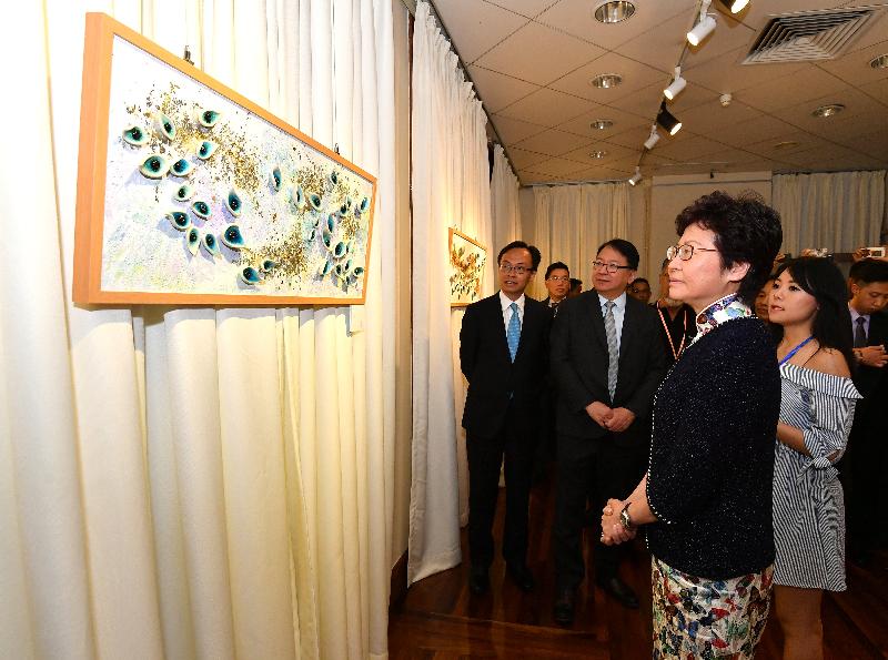 The Chief Executive, Mrs Carrie Lam, visited Macau today (August 18). Photo shows Mrs Lam (second right), accompanied by the Secretary for Constitutional and Mainland Affairs, Mr Patrick Nip (first left), and the Director of the Chief Executive's Office, Mr Chan Kwok-ki (second left), visiting 10 Fantasia in Macau.