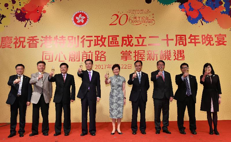 The Chief Executive, Mrs Carrie Lam, attended the Celebration of the 20th Anniversary of the Establishment of the Hong Kong Special Administrative Region Gala Banquet in Shanghai tonight (August 22). Photo shows Mrs Lam (centre); the Executive Vice Mayor of the Shanghai Municipal Government, Mr Zhou Bo (fourth left); the Secretary for Constitutional and Mainland Affairs, Mr Patrick Nip (fourth right); the Director of the Chief Executive's Office, Mr Chan Kwok-ki (third right); and other guests at the toasting ceremony.