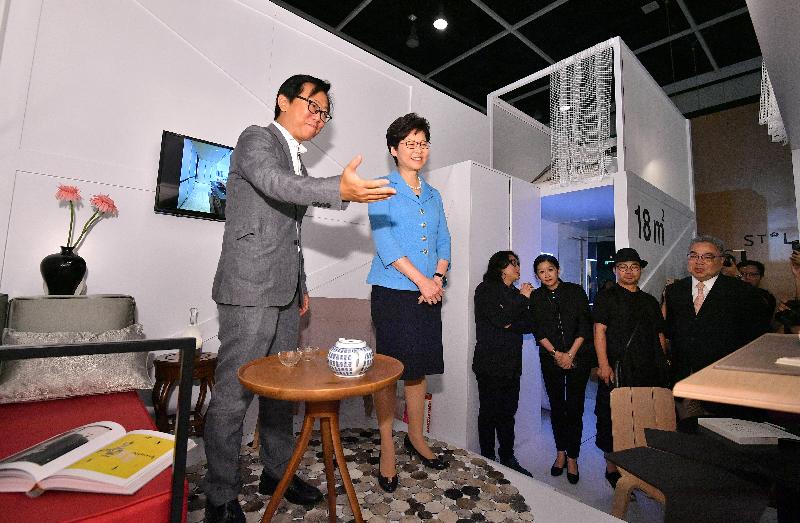 The Chief Executive, Mrs Carrie Lam (second left), tours the International Design Furniture Fair Hong Kong at the Hong Kong Convention and Exhibition Centre today (August 25). 