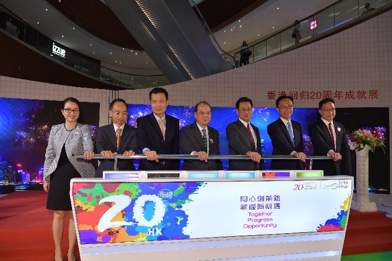 The Chief Secretary for Administration, Mr Matthew Cheung Kin-chung, attended the opening ceremony of "Together • Progress • Opportunity - Exhibition in Celebration of the 20th Anniversary of the Return of Hong Kong to the Motherland" in Guangzhou today (August 25). Photo shows Mr Cheung (centre); the Director of the Hong Kong Economic and Trade Office in Guangdong, Mr Albert Tang (second left); the Director General of the Hong Kong and Macao Affairs Office of the People's Government of Guangdong Province, Mr Liao Jingshan (third left); Member of the Organisation of Communist Party of China of the People's Government of Guangdong Province Mr Chen Yunxian (third right); the Secretary for Constitutional and Mainland Affairs, Mr Patrick Nip (second right); and other guests officiating at the ceremony. 