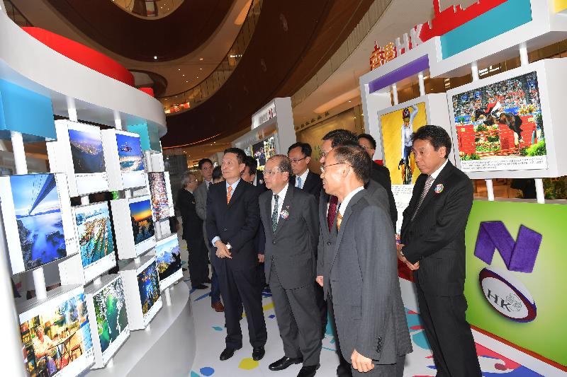 The Chief Secretary for Administration, Mr Matthew Cheung Kin-chung, attended the opening ceremony of "Together • Progress • Opportunity - Exhibition in Celebration of the 20th Anniversary of the Return of Hong Kong to the Motherland" in Guangzhou today (August 25). Photo shows Mr Cheung (second left); the Director General of the Hong Kong and Macao Affairs Office of the People's Government of Guangdong Province, Mr Liao Jingshan (first left); Member of the Organisation of Communist Party of China of the People's Government of Guangdong Province Mr Chen Yunxian (third right); the Secretary for Constitutional and Mainland Affairs, Mr Patrick Nip (third left); the Director of the Hong Kong Economic and Trade Office in Guangdong, Mr Albert Tang (second right), and other guests touring the exhibition. 
