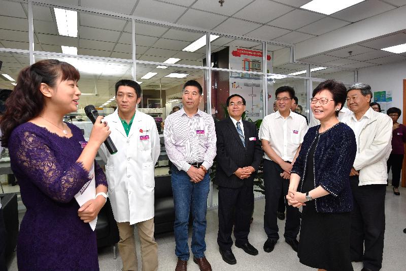 The Chief Executive, Mrs Carrie Lam, visited the Tianjin International Joint Academy of Biomedicine (TJAB) in Tianjin today (August 27). Photo shows Mrs Lam (front row, right) touring the co-working space in the TJAB and chatting with entrepreneurs.
