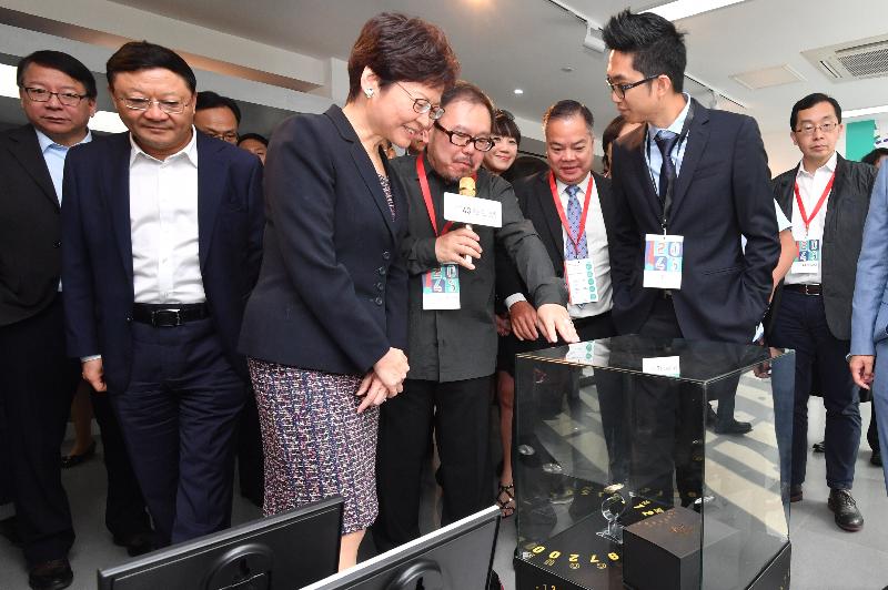 The Chief Executive, Mrs Carrie Lam, today (August 31) attended the opening ceremony of the "20.....43 Business of Hong Kong Design" - Shenzhen exhibition at the Qianhai Shenzhen-Hong Kong Innovation Center in Shenzhen. Photo shows Mrs Lam (front row, first left) touring the exhibition and receiving a briefing on the exhibits by the Secretary General of the Hong Kong Federation of Design Associations, Mr Freeman Lau　(front row, second left).