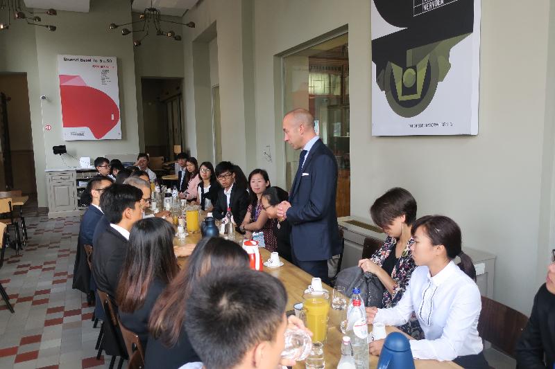 During a visit to the Train World railway museum in Brussels, Belgium, a group of young Hong Kong people taking part in the "Walk the Hong Kong Spirit" programme are briefed by the Chief Financial Officer of the Belgian railway company, SNCB/NMBS, Mr Olivier Henin, on August 30.