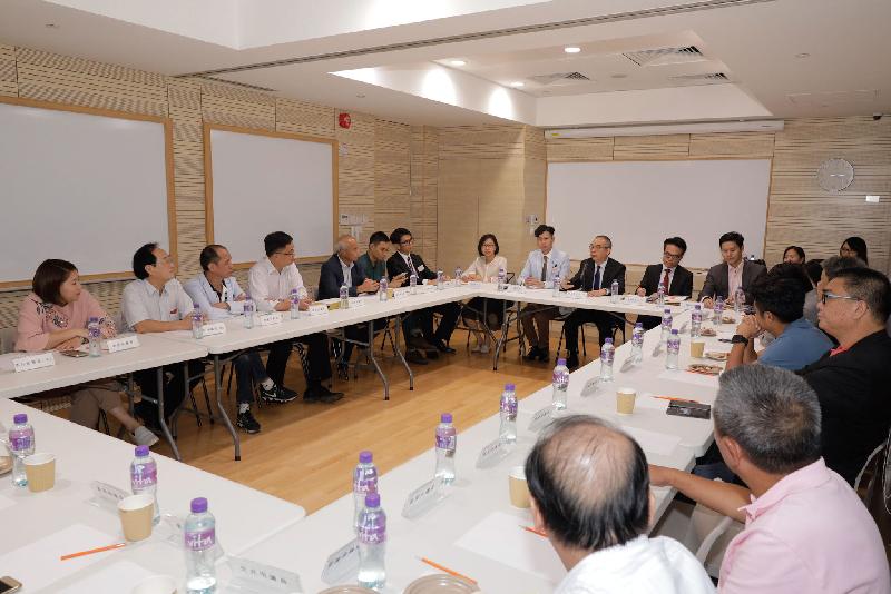 The Secretary for Home Affairs, Mr Lau Kong-wah (10th left), today (September 8) visits Yuen Long District and meets with Yuen Long District Council members to exchange views on various district issues and matters of concern.