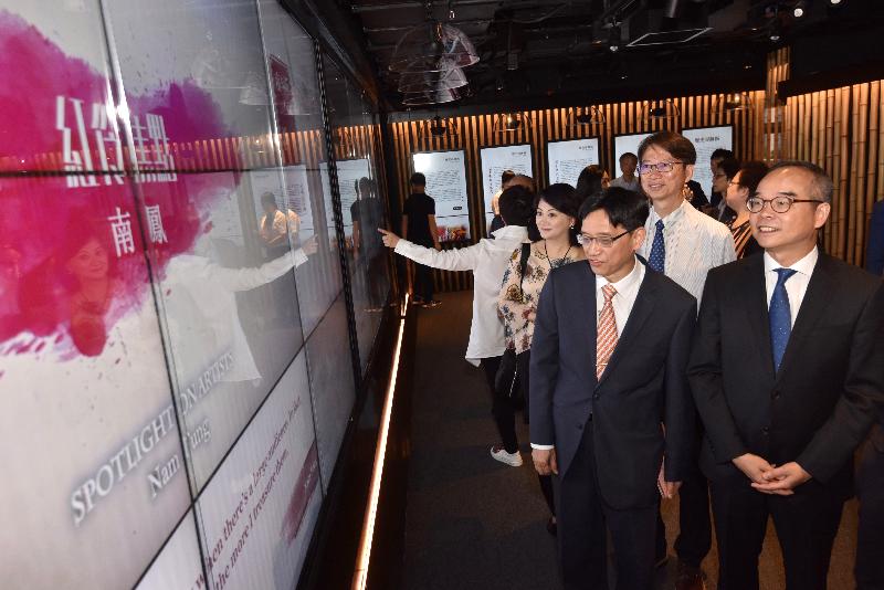 The Secretary for Home Affairs, Mr Lau Kong-wah (first right), tours the Cantonese Opera Education and Information Centre with other guests after officiating at the opening ceremony today (September 9).