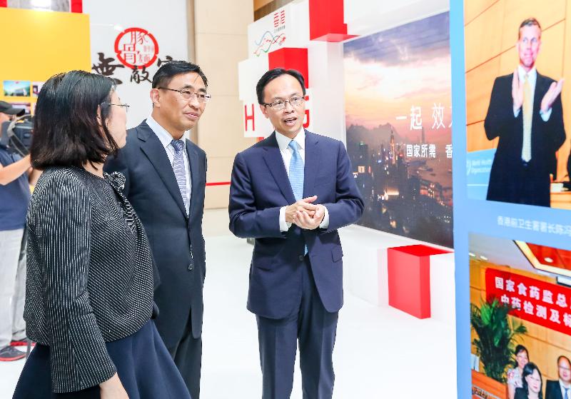 The Secretary for Constitutional and Mainland Affairs, Mr Patrick Nip (first right), tours the "Together · Progress · Opportunity" Exhibition in Celebration of the 20th Anniversary of the Return of Hong Kong to the Motherland in Tianjin today (September 14).