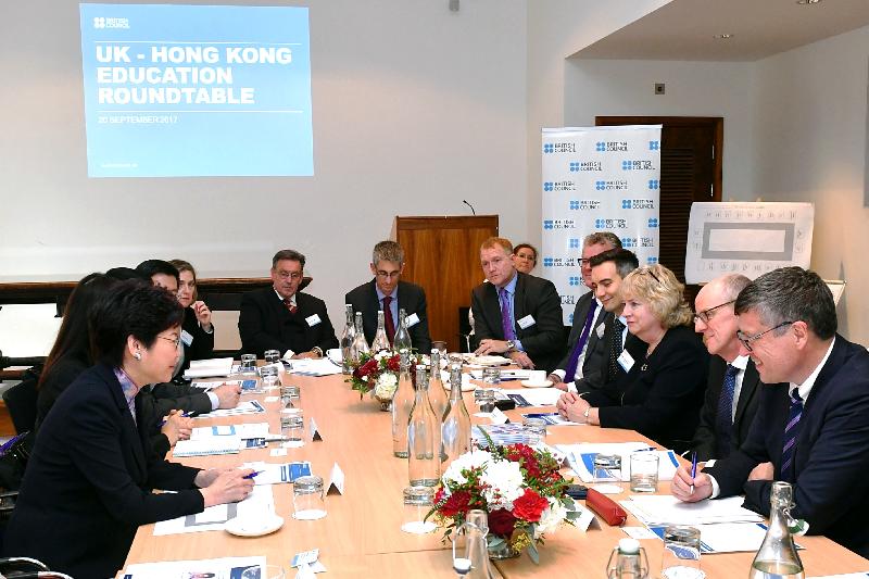 The Chief Executive, Mrs Carrie Lam, attends a roundtable discussion with education stakeholders in London, the United Kingdom, today (September 20, London time). Picture shows Mrs Lam (first left); the Minister of State at the Department for Education of the United Kingdom, Mr Nick Gibb (second right); and other participants at the discussion.