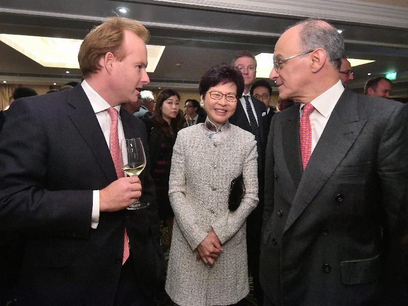 The Chief Executive, Mrs Carrie Lam, attended a luncheon organised by the Hong Kong Association in London, the United Kingdom, today (September 22, London time). Picture shows Mrs Lam (centre); the Chief Executive Officer of the John Swire & Sons, Mr Merlin Swire (left); and Executive Director of Jardine Matheson Holdings, Lord Sassoon (right) at the reception before the luncheon.