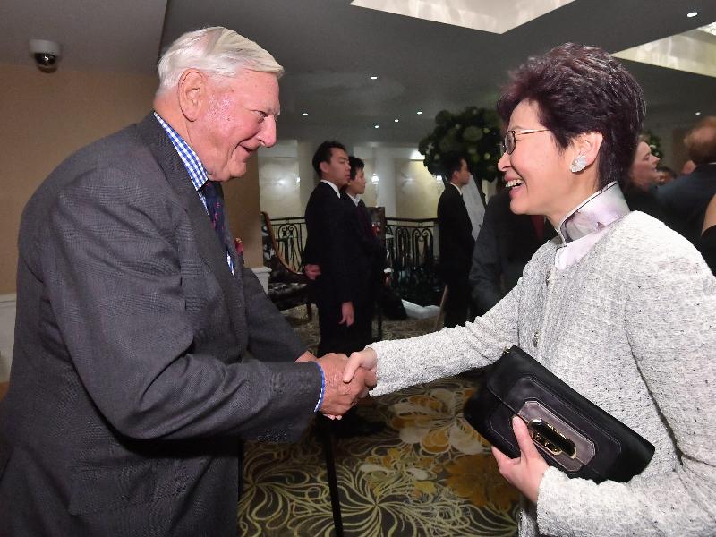 The Chief Executive, Mrs Carrie Lam, attended a luncheon organised by the Hong Kong Association in London, the United Kingdom, today (September 22, London time). Picture shows Mrs Lam (right) and former Group Chairman of HSBC Holdings, Sir William Purves; at the reception before the luncheon.