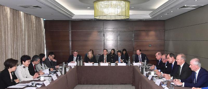 The Chief Executive, Mrs Carrie Lam (second left), attended a discussion with stakeholders on asset management under the Belt and Road Initiative in London, the United Kingdom, today (September 22, London time). The Secretary for Financial Services and the Treasury, Mr James Lau (third left) and the Chairman of the Financial Services Development Council, Mrs Laura M Cha (first left) also joined the discussion.