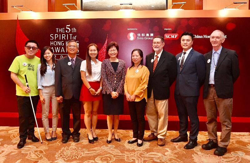 The Chief Executive, Mrs Carrie Lam, attended the SCMP's 5th Spirit of Hong Kong Awards presentation dinner today (September 29). Photo shows Mrs Lam (centre) and the award winners at the awards presentation dinner.