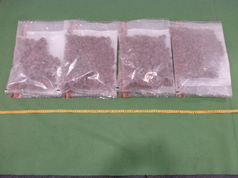 Hong Kong Customs seized about 1.2 kilograms of suspected cannabis buds with an estimated market value of about $250,000 at Hong Kong International Airport on September 29.