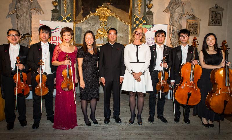 The Director-General of the Hong Kong Economic and Trade Office, London, Ms Priscilla To (fourth left), with the Hong Kong String Orchestra, led by the founder and Artistic Director of the Orchestra, Ms Jue Yao (third left), and the other key speakers at the  reception to commemorate the 20th anniversary of the establishment of the Hong Kong Special Administrative Region at the Swedish History Museum in Stockholm, including the Vice-Chairman of the Hong Kong Chamber of Commerce in Sweden Ms Torborg Chetkovich (fourth right), and the Chinese Ambassador to Sweden, Mr Congyou Gui (fifth right) on October 11 (Swedish time).