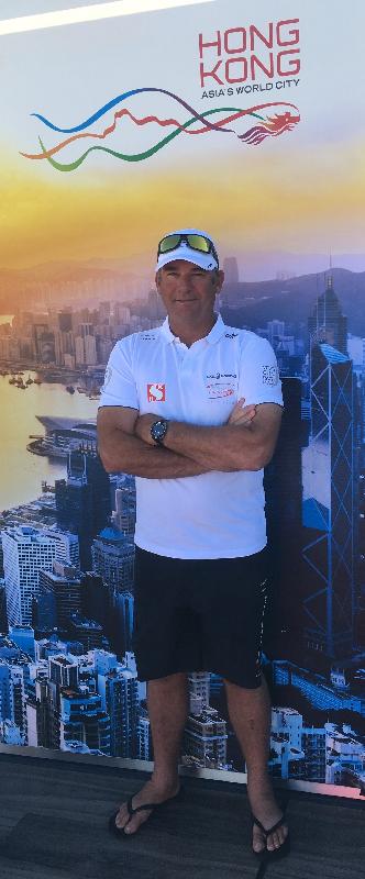 Brand Hong Kong (BrandHK) is serving as a supporting organisation for Team Sun Hung Kai/Scallywag, which is representing Hong Kong in the 2017-18 Volvo Ocean Race. Photo shows Scallywag skipper David Witt and the BrandHK logo at the Scallywag Team base in Alicante, Spain today (October 20, Alicante time). 