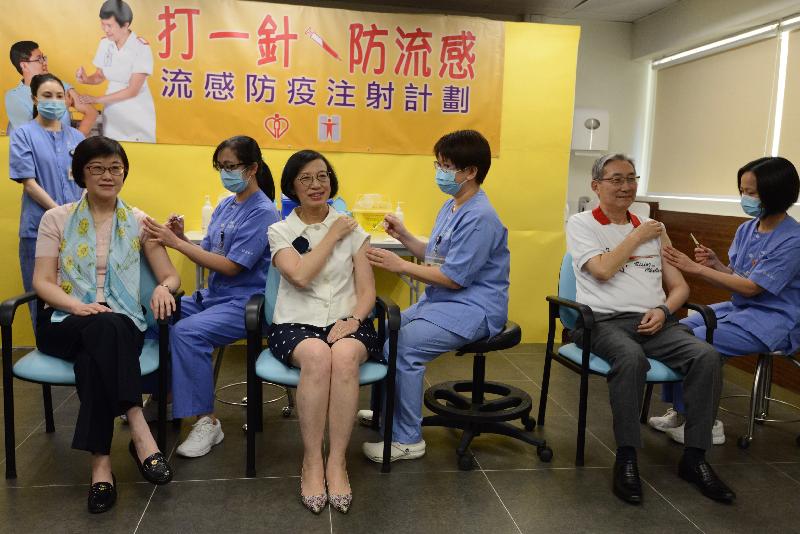 The Secretary for Food and Health, Professor Sophia Chan (third left); the Chairman of the Hospital Authority, Professor John Leong (second right); and the Director of Health, Dr Constance Chan (first left), receive their seasonal influenza vaccinations today (October 30).
