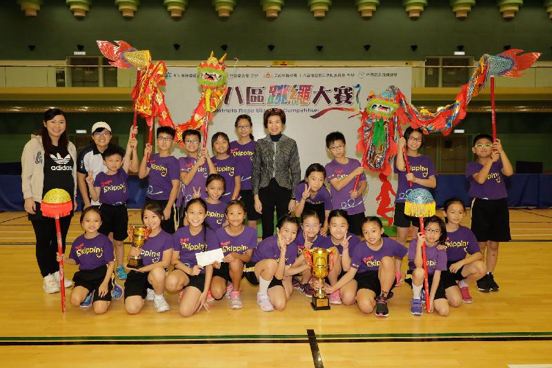 The Deputy Director of Home Affairs, Miss Charmaine Wong (back row, fifth right), today (November 5) is pictured with the champion of the primary school section of the 18 Districts Rope Skipping Competition, Buddhist Chan Wing Kan Memorial School.