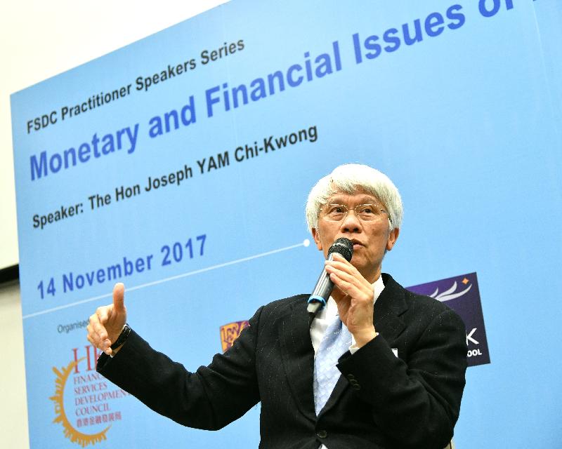 The Financial Services Development Council and the Chinese University of Hong Kong jointly held a career forum entitled "Monetary and Financial Issues of Hong Kong" today (November 14). Photo shows Non-Official Member of the Executive Council, Distinguished Research Fellow of the Lau Chor Tak Institute of Global Economics and Finance at the Chinese University of Hong Kong and Executive Vice President of the China Society for Finance and Banking Mr Joseph Yam providing participants with insights on the latest developments of the monetary and financial market of Hong Kong amid the intense competition and regulatory changes in the region.