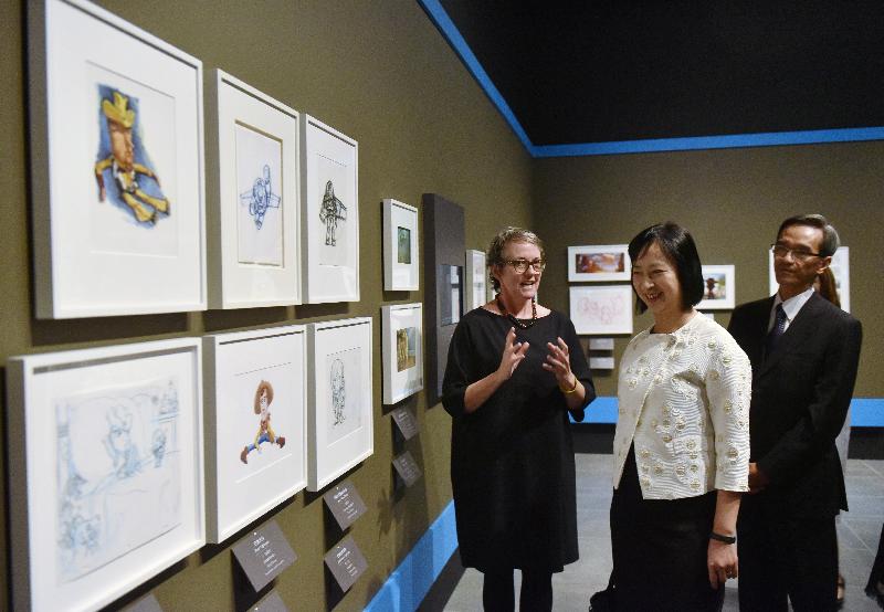 The opening ceremony of "Pixar 30 Years of Animation: Hong Kong Celebration of Friendship and Family" exhibition was held today (November 17) at the Hong Kong Heritage Museum. Photo shows officiating guests  (from left), the Senior Manager of Museum and Exhibitions Program of Pixar Animation Studios, Ms Maren Jones; the Director of Leisure and Cultural Services, Ms Michelle Li; and the Chairman of the Museum Advisory Committee, Mr Stanley Wong, touring the exhibition.