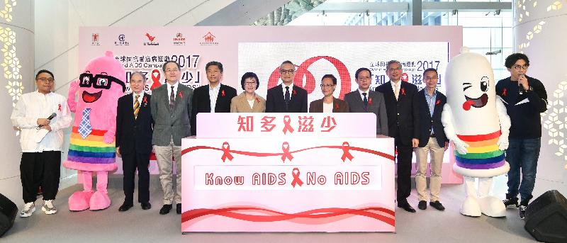 (From left) Artiste Cheng Sze-kwan, the Chairman of the Red Ribbon Centre Management Advisory Committee, Dr Richard Tan; the Chairperson of the Hong Kong Advisory Council on AIDS, Dr Patrick Li; the Deputy Director of the Shenzhen Centre for Disease Control and Prevention, Dr Ma Hanwu; the Director of Health, Dr Constance Chan; the Under Secretary for Food and Health, Dr Chui Tak-yi; the Chairman of the Family Planning Association of Hong Kong, Ms Lina Yan; the Secretary General of the AIDS Prevention and Control Commission of Macau, Dr Lam Chong; the Chairman of the Council for the AIDS Trust Fund, Dr Thomas Lai; and the Controller of the Centre for Health Protection of the Department of Health, Dr Wong Ka-hing; and artiste Luk Wing-kuen today (November 18) pictured with condom mascots at the World AIDS Campaign 2017 Creative School Projects on HIV/AIDS Prevention Award Presentation Ceremony.