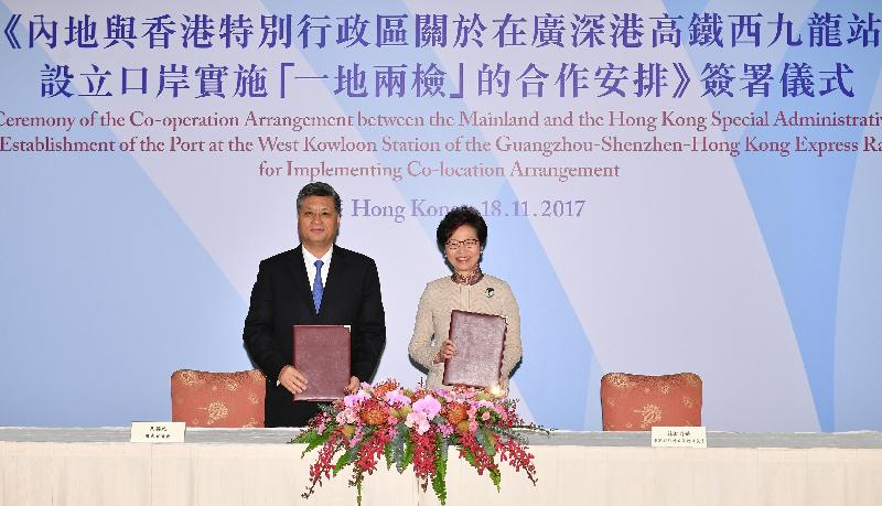 The Chief Executive, Mrs Carrie Lam, attended the Signing Ceremony of the Co-operation Arrangement between the Mainland and the Hong Kong Special Administrative Region on the Establishment of the Port at the West Kowloon Station of the Guangzhou-Shenzhen-Hong Kong Express Rail Link for Implementing Co-location Arrangement today (November 18) at Government House. Photo shows Mrs Lam (right) and the Governor of Guangdong Province, Mr Ma Xingrui (left) at the ceremony.