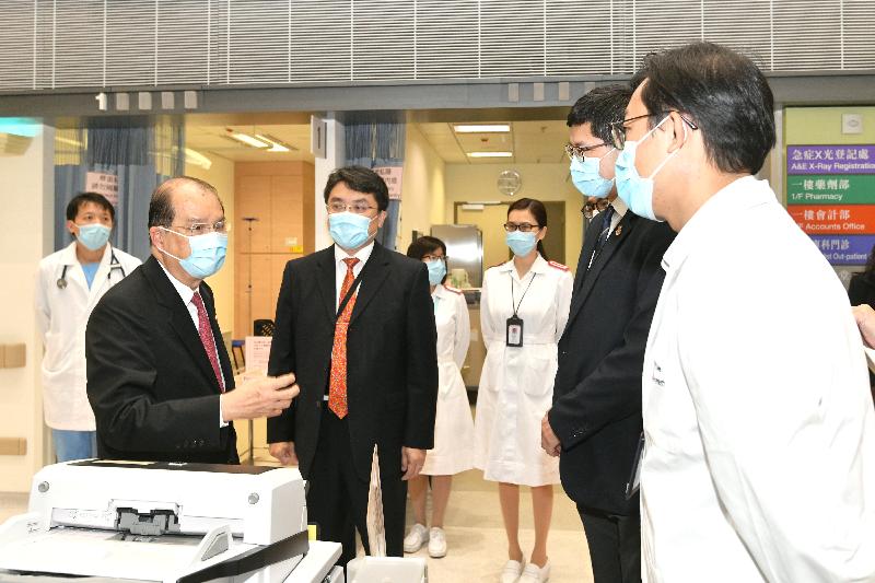 The Chief Secretary for Administration, Mr Matthew Cheung Kin-chung (first left), today (November 20) visits Tin Shui Wai Hospital (TSWH) and is given a briefing on its operation. Also present are the Cluster Chief Executive of New Territories West Cluster of the Hospital Authority, Dr Tony Ko (second right), and the Hospital Chief Executive of TSWH, Dr Deacons Yeung (second left).