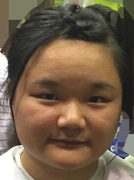 Lai Nga-man Maggie, aged 16, is about 1.55 metres tall, 68 kilograms in weight and of fat build. She has a round face with yellow complexion and long straight black hair. She was last seen wearing long-sleeved shirt with black and white stripes, black skirt, beige-coloured sandals and carrying a purple backpack.