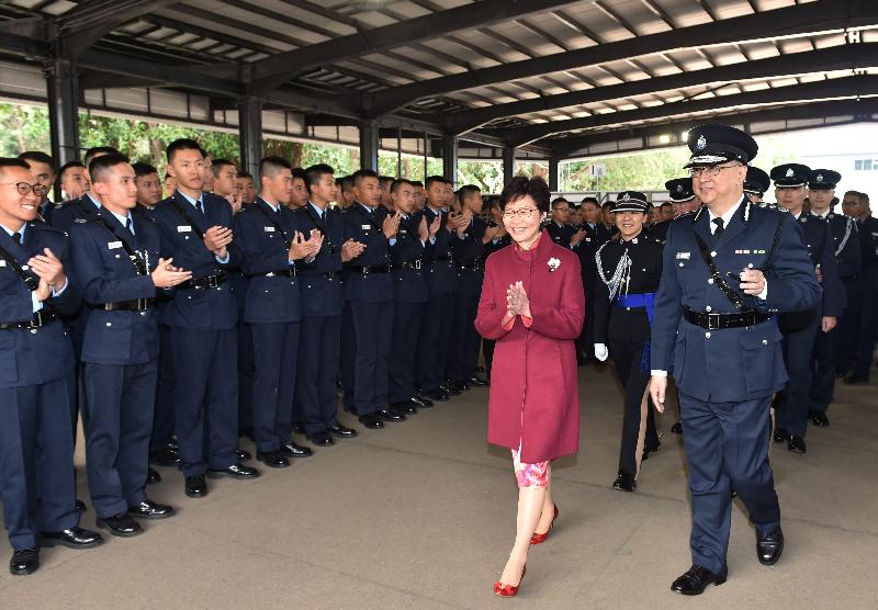 The Chief Executive, Mrs Carrie Lam, accompanied by the Commissioner of Police, Mr Lo Wai-chung, meets the graduates after the passing-out parade.
