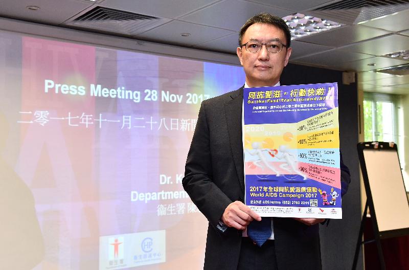 The Consultant (Special Preventive Programme) of the Centre for Health Protection of the Department of Health, Dr Kenny Chan, is today (November 28) pictured with a poster showing objectives in controlling Acquired Immune Deficiency Syndrome (AIDS) in support of World AIDS Day on December 1.