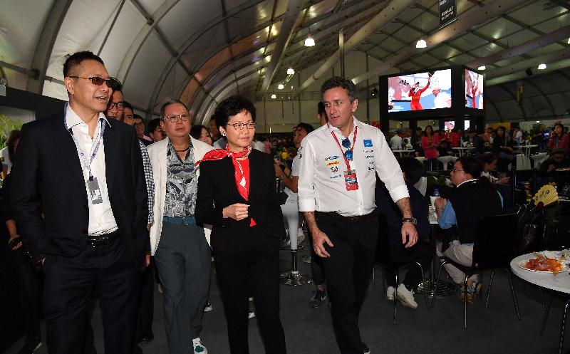 The Chief Executive, Mrs Carrie Lam (third left), tours Emotion Club after the 2017 FIA Formula E Hong Kong E-Prix opening ceremony in Central today (December 2).