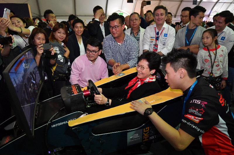 The Chief Executive, Mrs Carrie Lam (centre), tours Emotion Club after the 2017 FIA Formula E Hong Kong E-Prix opening ceremony in Central today (December 2). Looking on is the Secretary for Commerce and Economic Development, Mr Edward Yau.
