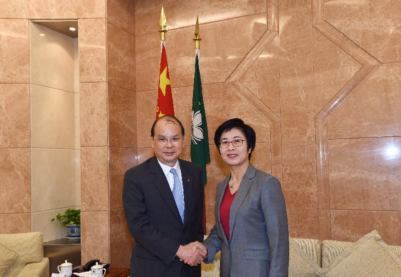 The Chief Secretary for Administration, Mr Matthew Cheung Kin-chung (left), meets the Secretary for Administration and Justice of the Macao Special Administrative Region, Ms Sonia Chan Hoi-fan, in Macao today (December 5).