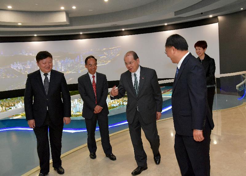 The Chief Secretary for Administration, Mr Matthew Cheung Kin-chung, visited Qianhai in Shenzhen today (December 7). Photo shows Mr Cheung (third left), accompanied by the Director of the Hong Kong Economic and Trade Office in Guangdong of the Government of the Hong Kong Special Administrative Region, Mr Albert Tang (second left), visiting the Qianhai Exhibition Hall.