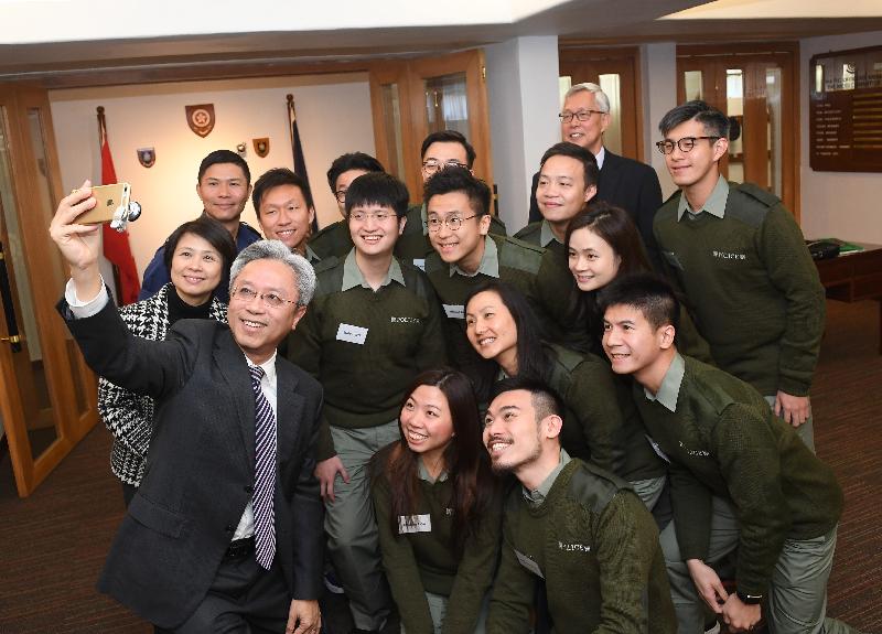 The Secretary for the Civil Service, Mr Joshua Law, today (December 8) visited the Hong Kong Police College. Photo shows Mr Law (front row, first left) taking a selfie with the Administrative Officers (AOs) participating in the Leadership Enhancement Programme at the College. On the second right of the back row is former Commissioner of Police Mr Dick Lee, who gave a talk to the AOs on leadership this morning.