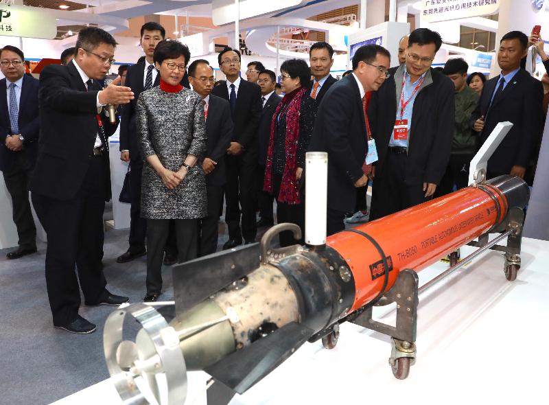 The Chief Executive, Mrs Carrie Lam (second left), tours the Scientific Institutions Innovation Fair of the 2017 China (Dongguan) International Science & Technology Cooperation Week in Dongguan today (December 8).