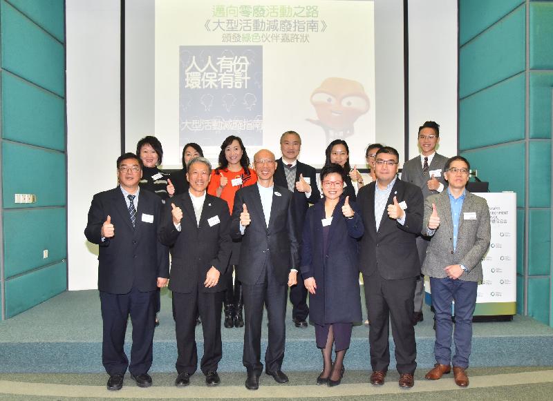 The Secretary for the Environment, Mr Wong Kam-sing (first row, third left); the Director of Operations of the Business Environment Council, Mr Leung Chi-fung (first row, second right); and the Deputy Director of Environmental Protection, Mrs Vicki Kwok (first row, third right), are pictured with the representatives of event organisers at "A Stepping Stone to Green Event: Release of Guidance Booklet and Experience Sharing Seminar" today (December 11).　
