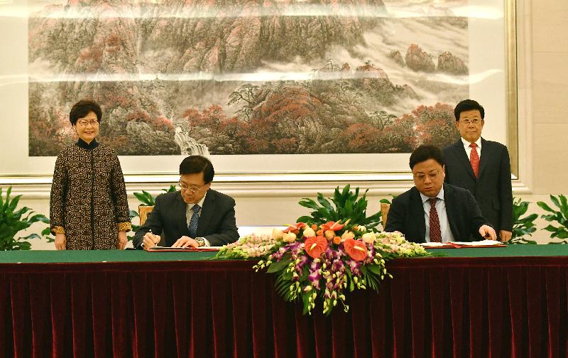 The Chief Executive, Mrs Carrie Lam, attended the signing ceremony of the "Arrangements on the Reciprocal Notification Mechanism between the Mainland and the Hong Kong Special Administrative Region Relating to Situations Including the Imposition of Criminal Compulsory Measures or the Institution of Criminal Prosecution" (the Arrangements) in Beijing this afternoon (December 14). Photo shows Mrs Lam (back row, left) and the Minister of Public Security, Mr Zhao Kezhi (back row, right), witnessing the signing of the Arrangements by the Secretary for Security, Mr John Lee (front row, left), and the Director of the Office of Hong Kong, Macao and Taiwan Affairs of the Ministry of Public Security, Mr Sun Lijun (front row, right).