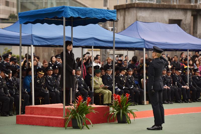 The Civil Aid Service (CAS) held the 78th Recruits Passing-out Parade at its headquarters today (December 17). Photo shows the Permanent Secretary for Security, Mrs Marion Lai, taking the salute from the parade.