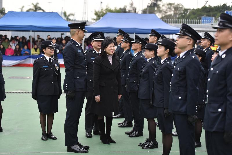 The Civil Aid Service (CAS) held the 78th Recruits Passing-out Parade at its headquarters today (December 17). Photo shows the Permanent Secretary for Security, Mrs Marion Lai, inspecting the parade.